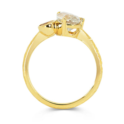 Lebrusan Studio Fancy Athena toi et moi engagement ring with hand-engraved Fairmined Eco Gold band and champagne fancy cut traceable ethical gemstones, side view